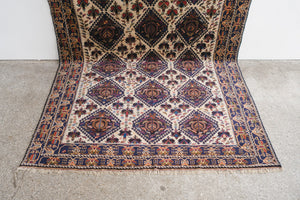 7x11 Baluch Rug