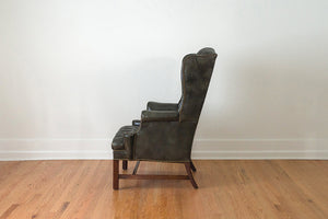 Tufted Green Leather Wing Chair