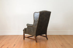 Tufted Green Leather Wing Chair