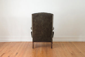 Tufted Green Leather Wing Chair